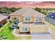 Charming two-story home with a well-manicured lawn and two car garage at 315 Wildflower Rd, Davenport, FL 33837