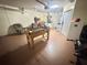 Spacious garage with a foosball table and seating area at 315 Wildflower Rd, Davenport, FL 33837