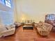 Spacious living room featuring lots of natural light and comfortable seating at 315 Wildflower Rd, Davenport, FL 33837