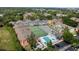 Aerial view of pool, tennis court, and playground for community residents at 3151 Britannia Blvd # C, Kissimmee, FL 34747
