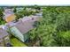 Aerial view of the condominium complex surrounded by lush greenery at 3151 Britannia Blvd # C, Kissimmee, FL 34747