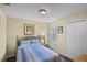 Cozy bedroom with a queen bed, a window, and a closet at 3151 Britannia Blvd # C, Kissimmee, FL 34747