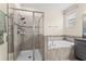 Bathroom with a large shower, a soaking tub, and dual shower heads at 3698 Cortland Dr, Davenport, FL 33837