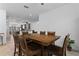 Rustic dining room with large wooden table, comfortable seating and ample natural light at 3698 Cortland Dr, Davenport, FL 33837