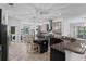 Bright kitchen with stainless steel appliances, granite countertops, a kitchen island and tile floors at 3698 Cortland Dr, Davenport, FL 33837