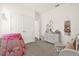 Well-organized Bedroom with white furniture, decorative mirrors, and a fun pink play tent for  at 4736 Homestead Trl, St Cloud, FL 34772