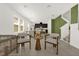 Open-concept living space with views of the kitchen, dining area, and an abundance of natural light at 4736 Homestead Trl, St Cloud, FL 34772