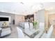 Open concept living space features a well-equipped kitchen, dining area, and comfortable living room perfect for entertaining at 4903 Windermere Ave, Kissimmee, FL 34746