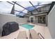 A private screened pool with fencing, perfect for outdoor entertainment and relaxation at 4903 Windermere Ave, Kissimmee, FL 34746