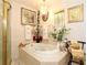 Modern bathroom featuring a soaking tub, glass-enclosed shower, and decorative fixtures at 860 Oak Shore Dr, St Cloud, FL 34771