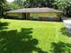Charming single-story home featuring a well-maintained lawn and stone accents at 860 Oak Shore Dr, St Cloud, FL 34771