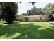 Inviting single story home with stone accents and lush green lawn at 860 Oak Shore Dr, St Cloud, FL 34771