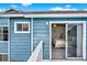 Exterior showing siding and access to a bedroom through a sliding glass door at 8716 Rain Forest Pl # D, Kissimmee, FL 34747