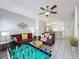 Spacious living room featuring a foosball table and an open floor plan at 109 Pompano Beach Dr, Kissimmee, FL 34746