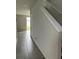 Hallway with modern tile flooring at 1210 Zambrana Ct, Winter Haven, FL 33884