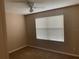 Bedroom with neutral paint, ceiling fan, and window with blinds at 13620 Cepheus Dr, Orlando, FL 32828