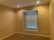 This bedroom offers neutral tones, a window for natural light, and comfortable carpet flooring at 13620 Cepheus Dr, Orlando, FL 32828