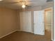 Bedroom with carpet flooring and large closet at 13620 Cepheus Dr, Orlando, FL 32828