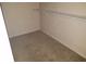 The closet has carpet and a metal rack at 13620 Cepheus Dr, Orlando, FL 32828