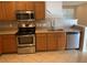 Well-equipped kitchen featuring stainless steel appliances and ample counter space at 13620 Cepheus Dr, Orlando, FL 32828
