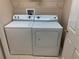Laundry room featuring modern appliances at 13620 Cepheus Dr, Orlando, FL 32828