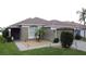 Charming single-story home with a well-manicured lawn and inviting entrance at 1364 Rebecca Dr, Haines City, FL 33844