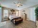This spacious main bedroom boasts a king bed, two dressers, and two nightstands at 1364 Rebecca Dr, Haines City, FL 33844