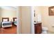Connected rooms showing a bathroom and a bedroom at 1375 Tuscana Ln # 1405, Davenport, FL 33896
