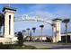 The formal entrance for Champions Gate with impeccable landscaping at 1375 Tuscana Ln # 1405, Davenport, FL 33896