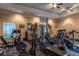 Well-equipped gym featuring modern exercise equipment for a comprehensive workout at 1375 Tuscana Ln # 1405, Davenport, FL 33896