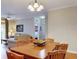 Open-concept living area with dining table and relaxed seating at 1375 Tuscana Ln # 1405, Davenport, FL 33896