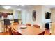 Spacious living space with dining table, bar seating, and TV at 1375 Tuscana Ln # 1405, Davenport, FL 33896