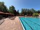 Resort-style pool with sun loungers, cabanas and beautiful landscaping at 1375 Tuscana Ln # 1405, Davenport, FL 33896
