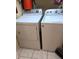 Functional laundry area featuring a side-by-side washer and dryer set, providing a convenient setup at 13838 Fairway Island Dr # 1418, Orlando, FL 32837