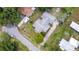 Aerial view displaying the home's roof, layout, driveway, and surrounding neighborhood at 1640 Marks St, Kissimmee, FL 34746