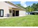 Rear patio and large grassy yard at 1843 Harbor Blvd, Kissimmee, FL 34744