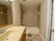 Bathroom featuring a large mirror and a tub and shower combo at 1843 Harbor Blvd, Kissimmee, FL 34744