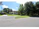 Charming two-story home with stone facade and mature trees at 1843 Harbor Blvd, Kissimmee, FL 34744