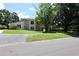 Charming two-story home with stone facade and mature trees at 1843 Harbor Blvd, Kissimmee, FL 34744