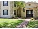 Attractive home features a stone accent wall, brick pathway, and a decorative front door at 1843 Harbor Blvd, Kissimmee, FL 34744