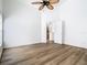 Bedroom with wood-look flooring and vaulted ceiling at 1851 Hammock Moss Dr, Orlando, FL 32820