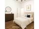 Staged bedroom featuring a dresser, ceiling fan, and a view to the closet at 1851 Hammock Moss Dr, Orlando, FL 32820