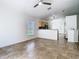 Spacious living room with ceiling fan and view of the kitchen at 1851 Hammock Moss Dr, Orlando, FL 32820