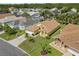 Charming one story home featuring a well manicured front lawn, a two car garage and beautiful landscaping at 1914 Ellery Ln, Kissimmee, FL 34746