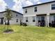 Expansive backyard featuring well-maintained lawn area and rear of the property at 2086 Crape Jasmine Ln, Orlando, FL 32824