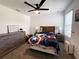 This cute bedroom has a ceiling fan and carpeted floors at 2086 Crape Jasmine Ln, Orlando, FL 32824