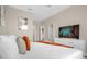 Comfortable bedroom featuring a TV, dresser, and neutral decor at 2307 Silver Palm Dr # 304, Kissimmee, FL 34747