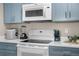 Updated kitchen featuring stainless steel appliances and quartz countertops at 2307 Silver Palm Dr # 304, Kissimmee, FL 34747