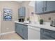 Modern kitchen with stainless steel appliances and ample counter space at 2307 Silver Palm Dr # 304, Kissimmee, FL 34747