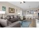 Comfortable living room with a large sofa and open floor plan at 2307 Silver Palm Dr # 304, Kissimmee, FL 34747